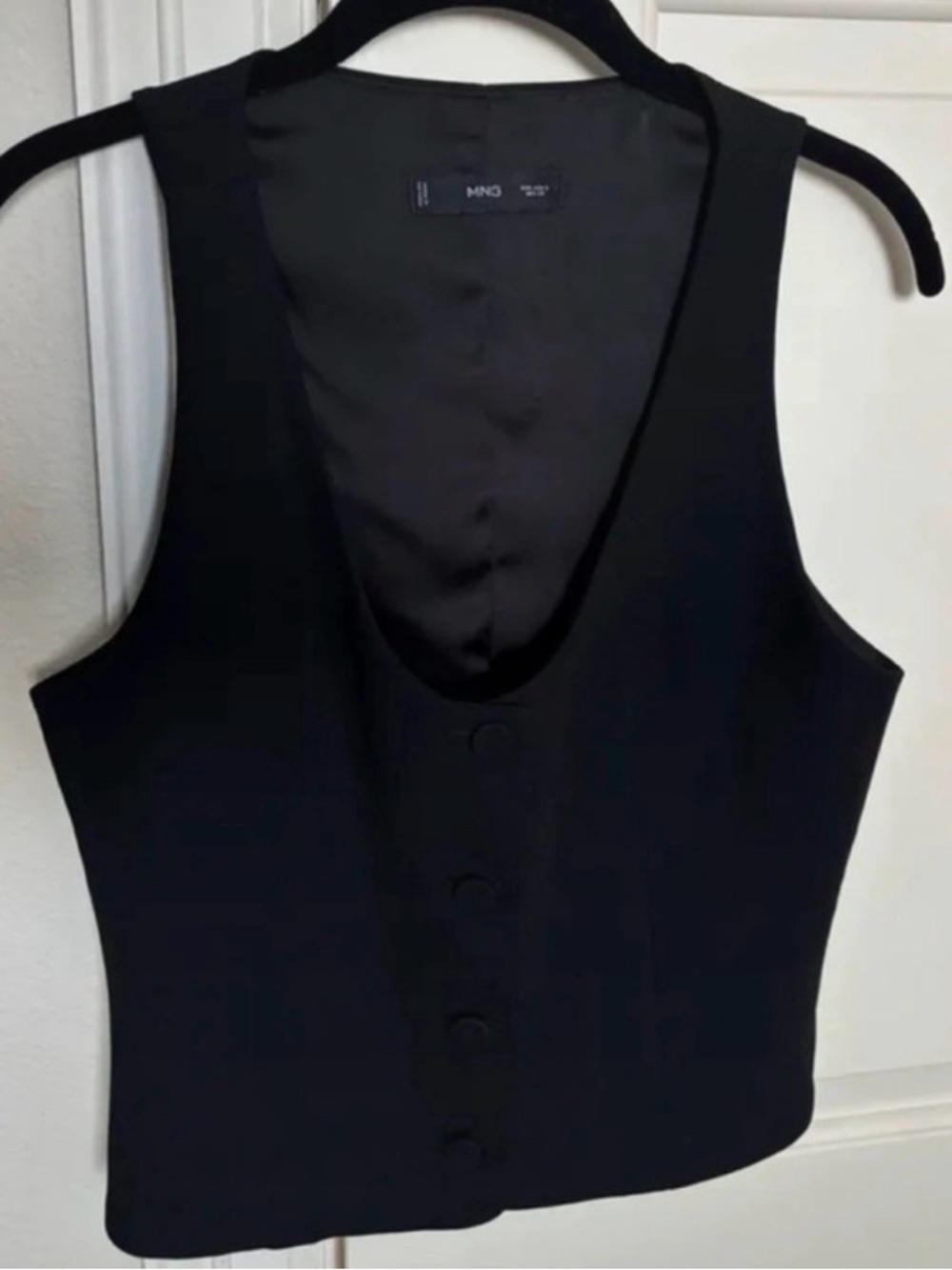 Black button down vest